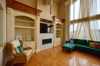 Photo 9: 36 Coulee Park SW in Calgary: Cougar Ridge Detached for sale : MLS®# A2127354