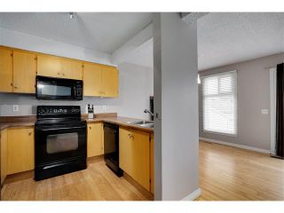 Photo 6: 24 WOODHILL Road SW in Calgary: Woodlands House for sale : MLS®# C4109351