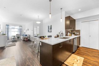Photo 2: 301 16 Auburn Bay Link SE in Calgary: Auburn Bay Apartment for sale : MLS®# A2077460