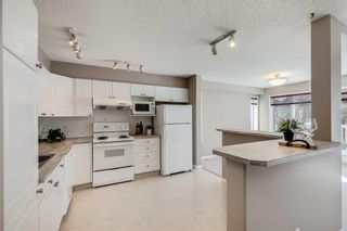 Photo 10: 23 200 Sandstone Drive NW in Calgary: Sandstone Valley Row/Townhouse for sale : MLS®# A2110515