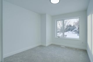 Photo 25: 907 Rundle Crescent NE in Calgary: Renfrew Semi Detached (Half Duplex) for sale : MLS®# A2025466