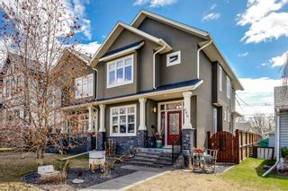 Photo 1: 906 33 Street NW in Calgary: Parkdale Semi Detached (Half Duplex) for sale : MLS®# A2122707