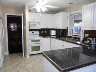 Photo 1: 21189 122ND AV in Maple Ridge: Northwest Maple Ridge House for sale : MLS®# V1080385