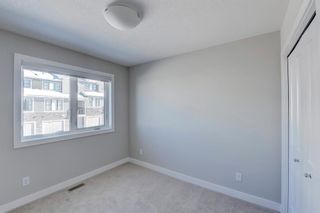 Photo 4: 908 Crestridge Common SW in Calgary: Crestmont Row/Townhouse for sale : MLS®# A2030391