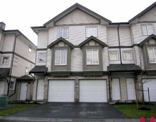 Main Photo: 9 14855 100TH AV in Surrey: Guildford Townhouse for sale in "HAMSTEAD MEWS" (North Surrey)  : MLS®# F2601858