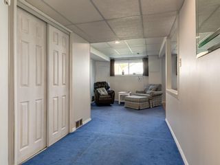 Photo 28: 2418 98 Avenue SW in Calgary: Palliser Duplex for sale : MLS®# A1025542