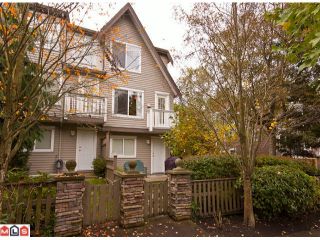 Photo 1: 34 15355 26TH Avenue in Surrey: King George Corridor Townhouse for sale in "South Wynd" (South Surrey White Rock)  : MLS®# F1025838