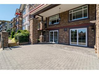 Photo 3: 204 19939 55A Avenue in Langley: Langley City Condo for sale in "Madison Crossing" : MLS®# R2261484