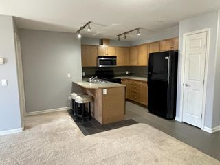 Photo 7: 3207 92 Crystal Shores Road: Okotoks Apartment for sale : MLS®# A1204476