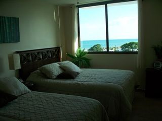 Photo 15: Playa Blanca Resort mid floor ocean view 199K