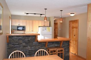 Photo 2: 101 1206 Bow Valley Trail: Canmore Row/Townhouse for sale : MLS®# C4290346