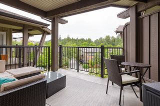 Photo 1: 410 400 KLAHANIE Drive in Port Moody: Port Moody Centre Condo for sale in "TIDES" : MLS®# R2702178