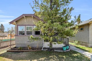 Photo 2: 211 15 Avenue NE in Calgary: Crescent Heights Detached for sale : MLS®# A2045080