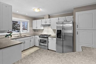 Photo 8: 6428 Law Drive SW in Calgary: Lakeview Detached for sale : MLS®# A2099489