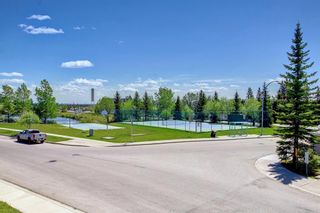 Photo 13: 404 Rocky Vista Gardens NW in Calgary: Rocky Ridge Row/Townhouse for sale : MLS®# A1229066