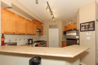 Photo 6: 111 2969 WHISPER Way in Coquitlam: Westwood Plateau Condo for sale in "SUMMERLIN AT SILVER SPRING" : MLS®# R2095964