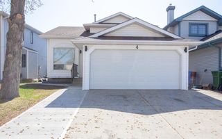 Photo 1: 4 Arbour Ridge Place NW in Calgary: Arbour Lake Detached for sale : MLS®# A2044785