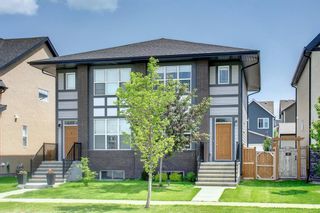 Photo 1: 837 Mahogany Boulevard SE in Calgary: Mahogany Semi Detached (Half Duplex) for sale : MLS®# A1230171