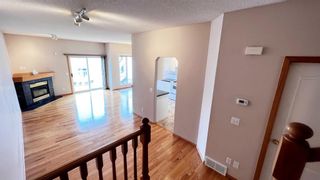 Photo 15: 128 Hamptons Link NW in Calgary: Hamptons Row/Townhouse for sale : MLS®# A1203033