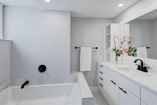 Photo 20: 28 Queen Isabella Close SE in Calgary: Queensland Detached for sale : MLS®# A2119933