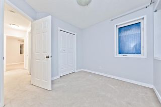 Photo 8: 167 BRIDLEWOOD CM SW in Calgary: Bridlewood House for sale