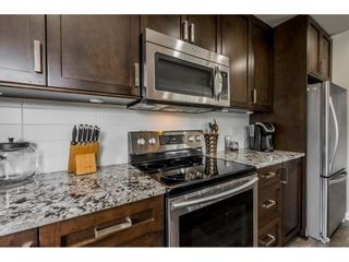Photo 10: 410 2242 WHATCOM Road in Abbotsford: Abbotsford East Condo for sale in "~The Waterleaf~" : MLS®# R2372629