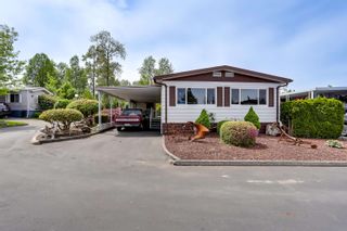 Photo 2: 126 8234 134 Street in Surrey: Queen Mary Park Surrey Manufactured Home for sale in "West Wood Gate" : MLS®# R2697305