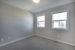 Photo 19: 103 Legacy View SE in Calgary: Legacy Row/Townhouse for sale : MLS®# A2038397