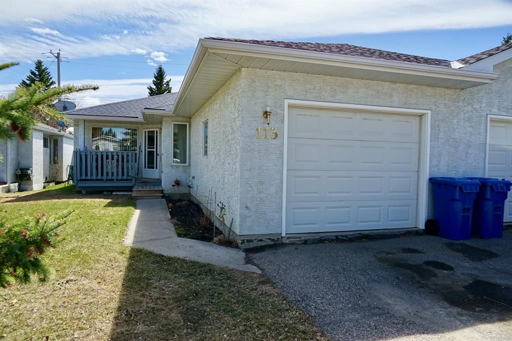 Main Photo: 113 Edgar Avenue NW: Turner Valley Semi Detached for sale : MLS®# A1101043