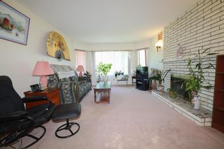 Photo 2: 1878 E 51ST Avenue in Vancouver: Killarney VE House for sale (Vancouver East)  : MLS®# R2596182