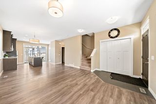 Photo 3: 527 Evanston Manor NW in Calgary: Evanston Row/Townhouse for sale : MLS®# A1195059