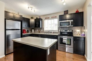 Photo 9: 111 Walden Drive SE in Calgary: Walden Semi Detached for sale : MLS®# A1221806