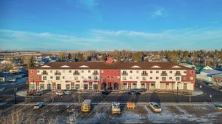 Photo 1: 320 1010 Railway Street: Crossfield Apartment for sale : MLS®# A2104648