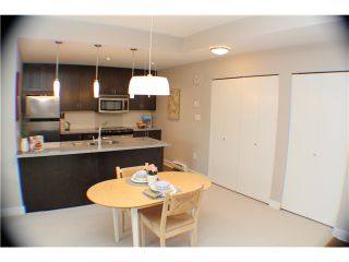 Photo 3: 407 2368 MARPOLE Avenue in Port Coquitlam: Central Pt Coquitlam Condo for sale in "RIVER ROCK LANDING" : MLS®# V1053124