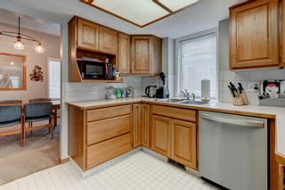 Photo 12: 100 Bow Landing NW in Calgary: Montgomery Semi Detached for sale : MLS®# A1232304