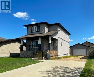 Photo 1: 301 12 Street SE in Slave Lake: House for sale : MLS®# A2049595