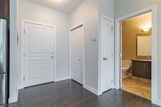 Photo 9: 303 48 Panatella Road NW in Calgary: Panorama Hills Apartment for sale : MLS®# A1231118