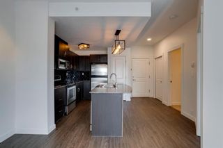 Photo 4: 4116 5605 Henwood Street SW in Calgary: Garrison Green Apartment for sale : MLS®# A1245062