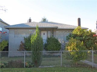 Photo 1: 1315 LAKEWOOD Drive in Vancouver: Grandview VE House for sale (Vancouver East)  : MLS®# V1033837