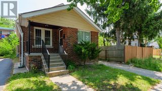 Photo 1: 1546 YORK in Windsor: House for sale : MLS®# 23016067