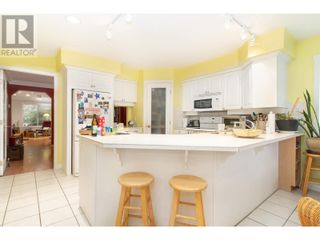Photo 2: 1321 Ridgeway Drive Unit# 102 in Kelowna: House for sale : MLS®# 10307413