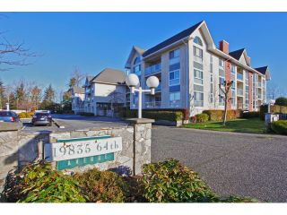 Photo 1: 215 19835 64TH Avenue in Langley: Willoughby Heights Condo for sale in "Willowbrook Gate" : MLS®# F1429929