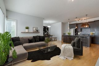 Photo 1: 207 1818 14 Street SW in Calgary: Lower Mount Royal Apartment for sale : MLS®# A2051072
