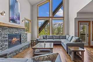 Photo 1: 101 2100D Stewart Creek Drive: Canmore Row/Townhouse for sale : MLS®# A2052195