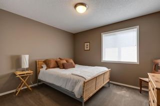 Photo 21: 124 Cougartown Close SW in Calgary: Cougar Ridge Detached for sale : MLS®# A2051695