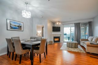 Photo 1: 110 20897 57 Avenue in Langley: Langley City Condo for sale in "Arbour Lane" : MLS®# R2430650