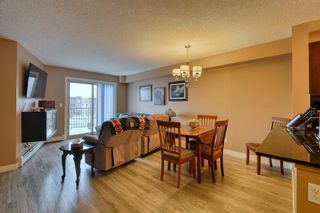Photo 4: 8414 403 Mackenzie Way SW: Airdrie Apartment for sale : MLS®# A1206659