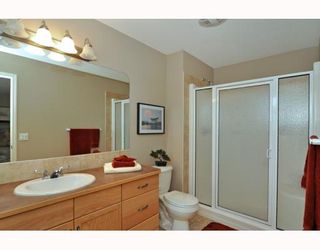 Photo 10: 579 STONEGATE Way NW: Airdrie Residential Attached for sale : MLS®# C3397152