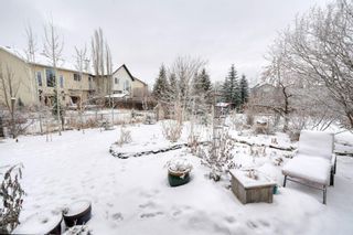 Photo 8: 133 Cougarstone Place SW in Calgary: Cougar Ridge Semi Detached for sale : MLS®# A1050548