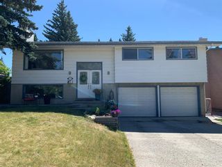 Photo 1: 5832 Lodge Crescent SW in Calgary: Lakeview Detached for sale : MLS®# A1046811